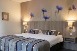 Postel nebo postele na pokoji v ubytování Landgoedhotel Woodbrooke Barchem