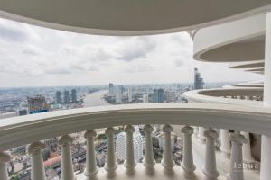 a view of the city from the balcony of a building at Tower Club at lebua in Bangkok
