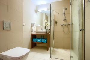 Kúpeľňa v ubytovaní Apartamenty AmberHome