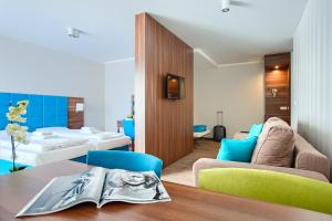 Posteľ alebo postele v izbe v ubytovaní Apartamenty AmberHome
