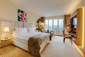 Voodi või voodid majutusasutuse Suitenhotel Parco Paradiso toas