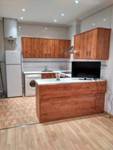A kitchen or kitchenette at Estudio Nueva Numancia