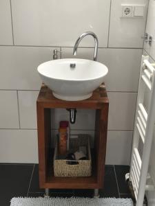 Vonios kambarys apgyvendinimo įstaigoje Ferienwohnung Landart