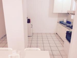 A kitchen or kitchenette at Korona Beach Apartments II