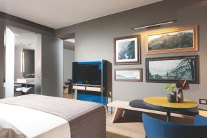Sjónvarps- og/eða afþreyingartæki á Parc Hotel Billia