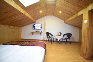 Voodi või voodid majutusasutuse Wuzhen On Memory Inn toas