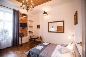 Posteľ alebo postele v izbe v ubytovaní Lovenovsky Apartments