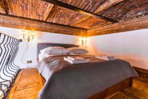 Posteľ alebo postele v izbe v ubytovaní Lovenovsky Apartments