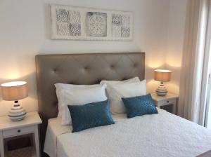 En eller flere senge i et værelse på Casa Alzira By ALzira