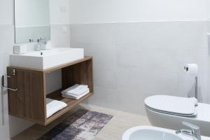 Ένα μπάνιο στο Carrera Home Appartamenti Verona - Bike Hotel