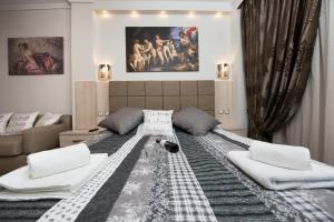 Katil atau katil-katil dalam bilik di Artemis Luxury Apartment