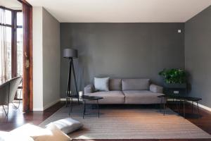 A seating area at DestinationBCN Universitat Apartments
