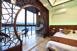 Кровать или кровати в номере Wuzhen On Memory Inn