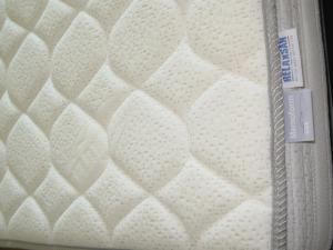 a close up of a mattress with a ruler on it at Torri Camuzzi Exclusive Luxury Apartment in Pescara +40 photos