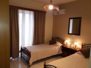 Posteľ alebo postele v izbe v ubytovaní COLONIAL FAMILY apartment #3