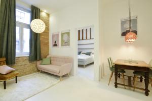 Posteľ alebo postele v izbe v ubytovaní Golden Leaf Apartment