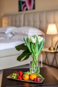 Voodi või voodid majutusasutuse Suitenhotel Parco Paradiso toas