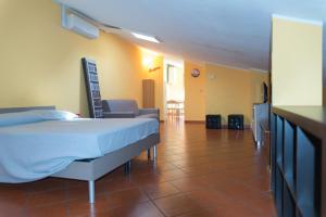 Postel nebo postele na pokoji v ubytování Al Cardinale Rooms & Studios