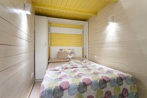a small bedroom with a bed in a room at Nice apartment in Sants in Barcelona