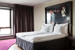 Postel nebo postele na pokoji v ubytování Comfort Hotel Square