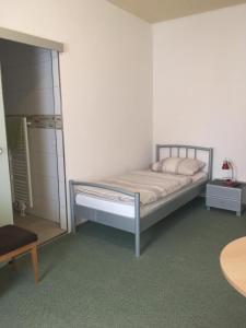 Ein Bett oder Betten in einem Zimmer der Unterkunft Germania Beck