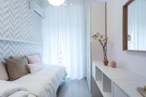 Posteľ alebo postele v izbe v ubytovaní Apartamentos Diaber Gerona 22