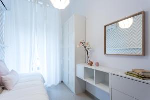 Posteľ alebo postele v izbe v ubytovaní Apartamentos Diaber Gerona 22