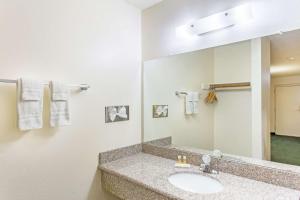 Kylpyhuone majoituspaikassa Travel Inn - Mesa