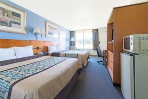 Ein Bett oder Betten in einem Zimmer der Unterkunft Days Inn by Wyndham Luray Shenandoah