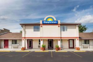 a days inn sign on the front of a building at Days Inn by Wyndham Plymouth in Plymouth