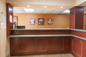 a bar in a waiting room at a hospital at Red Carpet Inn Elkton in Elkton