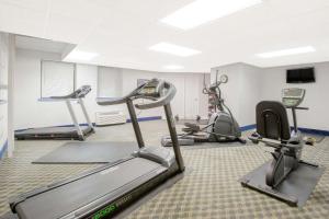 a gym with several exercise equipment in a room at Days Inn by Wyndham Gettysburg in Gettysburg