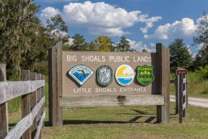 a sign at the entrance to the little shocks public lands at Days Inn by Wyndham Lake City I-10 in Lake City