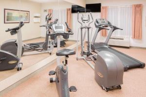 a gym with several exercise bikes in a room at Days Inn by Wyndham Hattiesburg MS in Hattiesburg