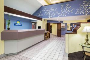 a view of the lobby of a disney inn at Days Inn by Wyndham Blue Springs in Blue Springs