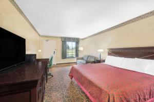 Cama o camas de una habitación en Days Inn & Suites by Wyndham York