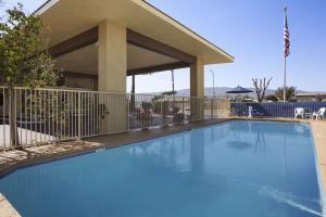 The swimming pool at or close to Days Inn by Wyndham Gilroy