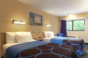 Postel nebo postele na pokoji v ubytování Days Inn by Wyndham Monmouth Junction-S Brunswick-Princeton