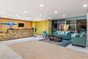 The lobby or reception area at Days Inn & Suites by Wyndham El Dorado