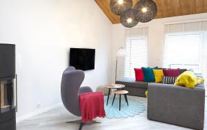 Televízia a/alebo spoločenská miestnosť v ubytovaní Apartament Sun House SAUNA KOMINEK SKRZYCZNE