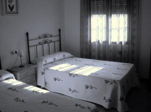 Postel nebo postele na pokoji v ubytování Posada La Reja