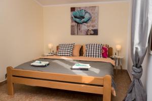 Postel nebo postele na pokoji v ubytování Apartment Oli