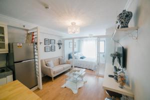 Televisyen dan/atau pusat hiburan di New York Suite at Oasis