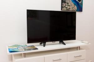 TV a/nebo společenská místnost v ubytování Apartment Oli