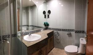 Kúpeľňa v ubytovaní Apartamento Las Palomas Beach 201