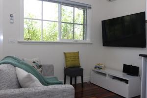 TV a/nebo společenská místnost v ubytování Westering Cottage