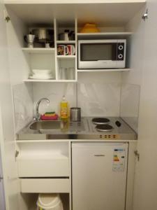 A kitchen or kitchenette at Le Suite dei Due Mari cucinino privato