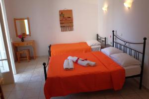 Posteľ alebo postele v izbe v ubytovaní Des Roses Hotel