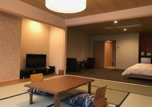 Зона вітальні в Hotel New Momiji