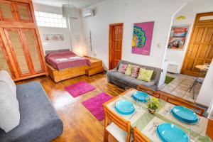 a living room with a couch and a table at Apartment near the Heroes Square in Budapest